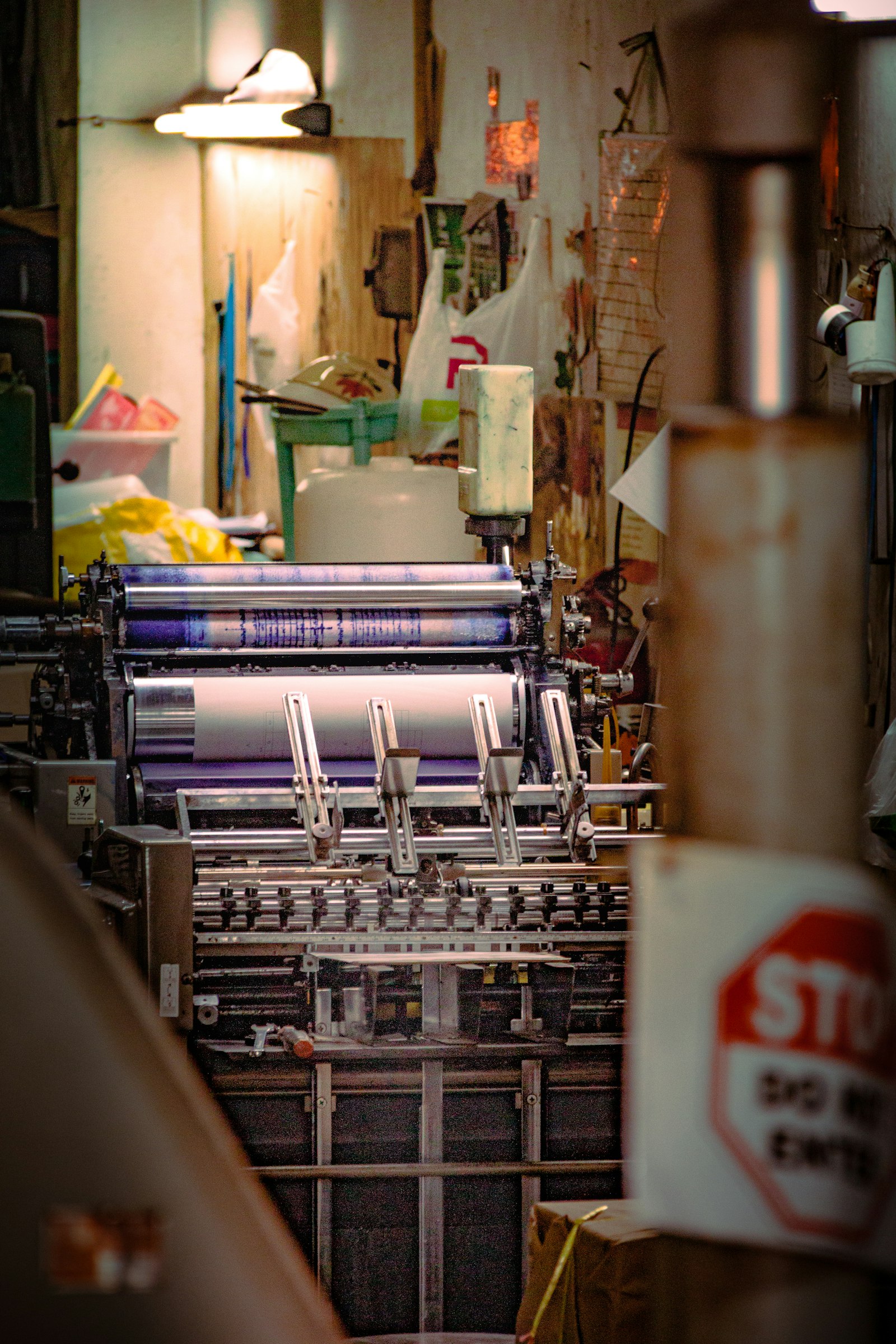 Printing press rollers covered in ink