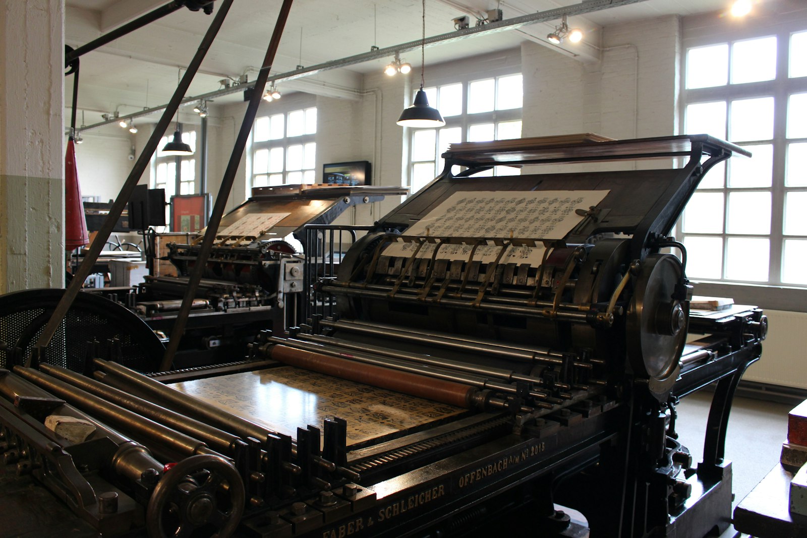 Antique letterpress printing presses in a workshop