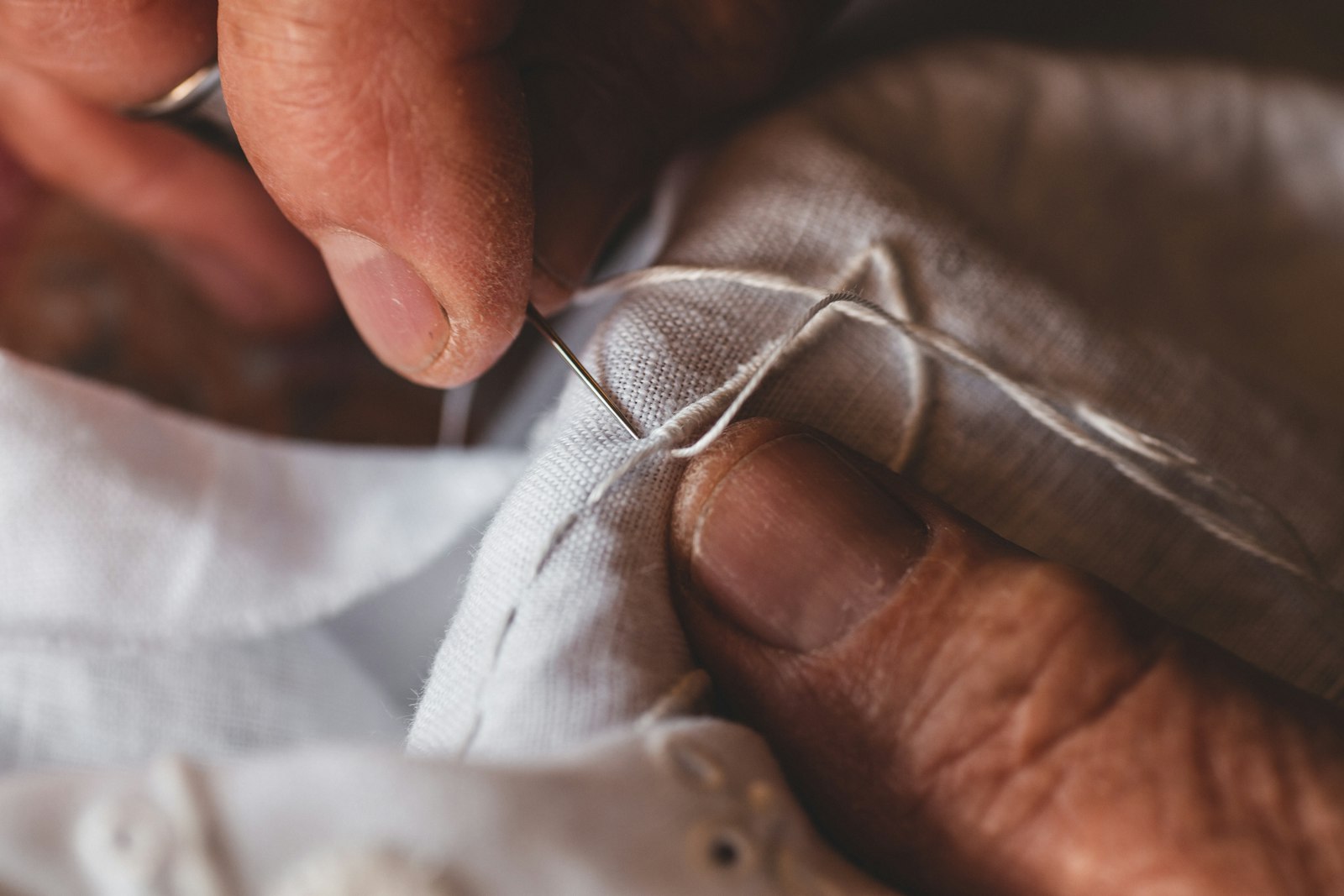 White thread and needlework close-up