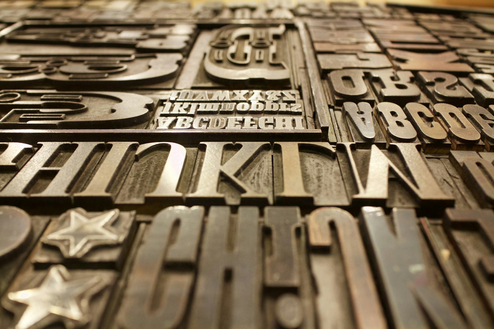 Close-up of metal and wood printing type locked in a forme