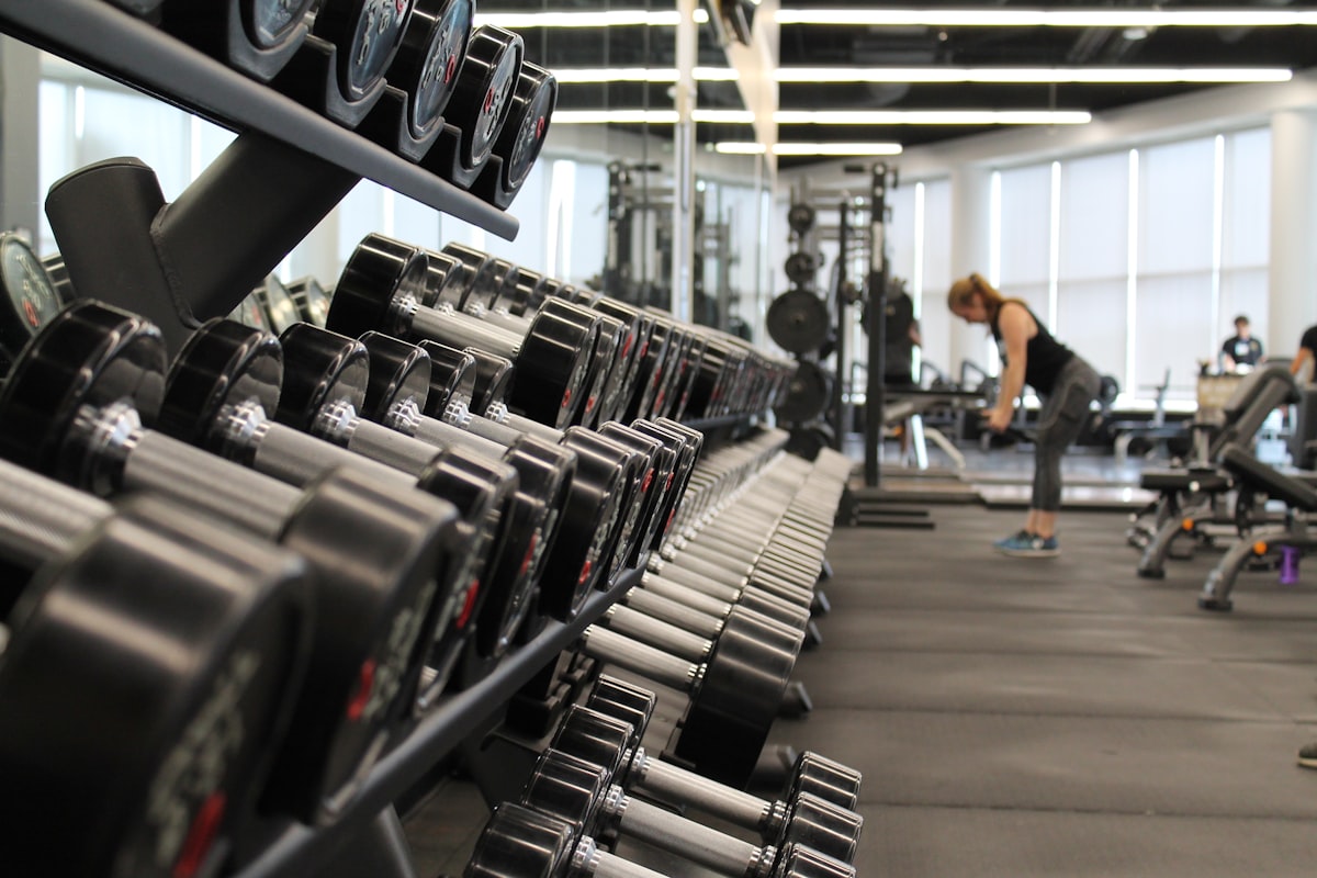 Rows of dumbbells on a gym rack