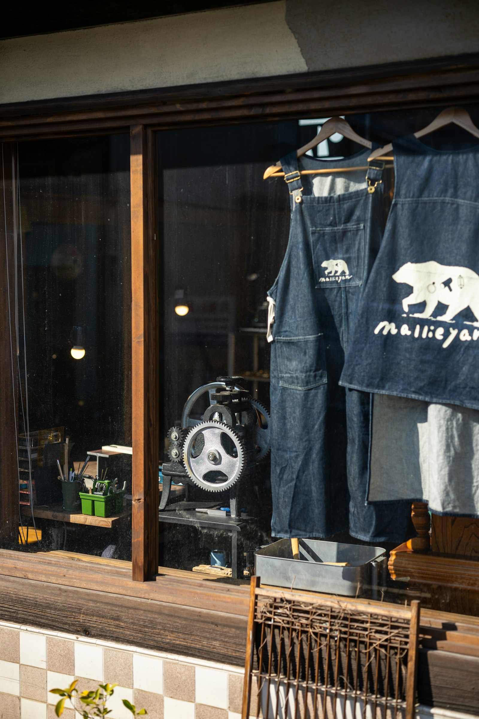 Storefront window display of a maker's shop
