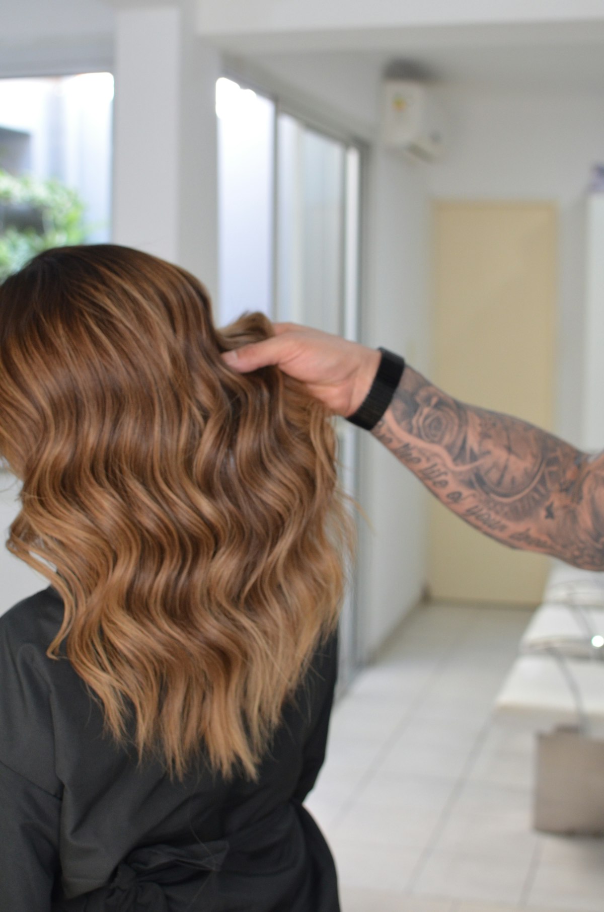 Freshly colored balayage waves seen from behind
